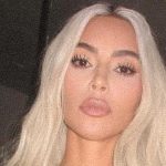 Kim Kardashian's Shiny Bathing Suits - Wow!