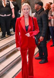 denise van outen in red velvet suit at london palladium event 6 thumbnail