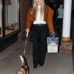 Lindsey Vonn in Chic Hat and Jacket for Aspen Holiday Shopping